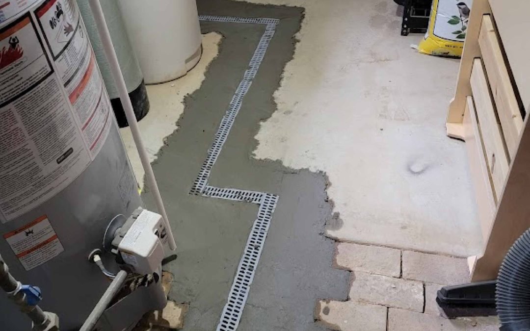 Experienced professionals applying waterproofing membrane to basement walls for effective moisture protection in Lancaster.